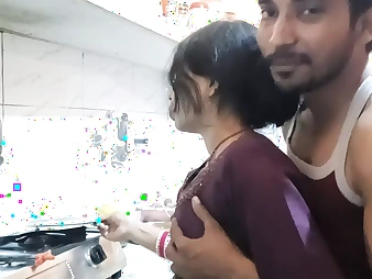 Molten Indian teen with gigantic tits gets frisky in the kitchen with her boyfriend