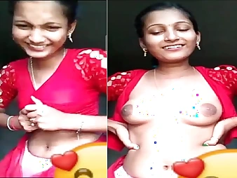 Inclement village girl teases in half-shirt plus style of will not hear of tits